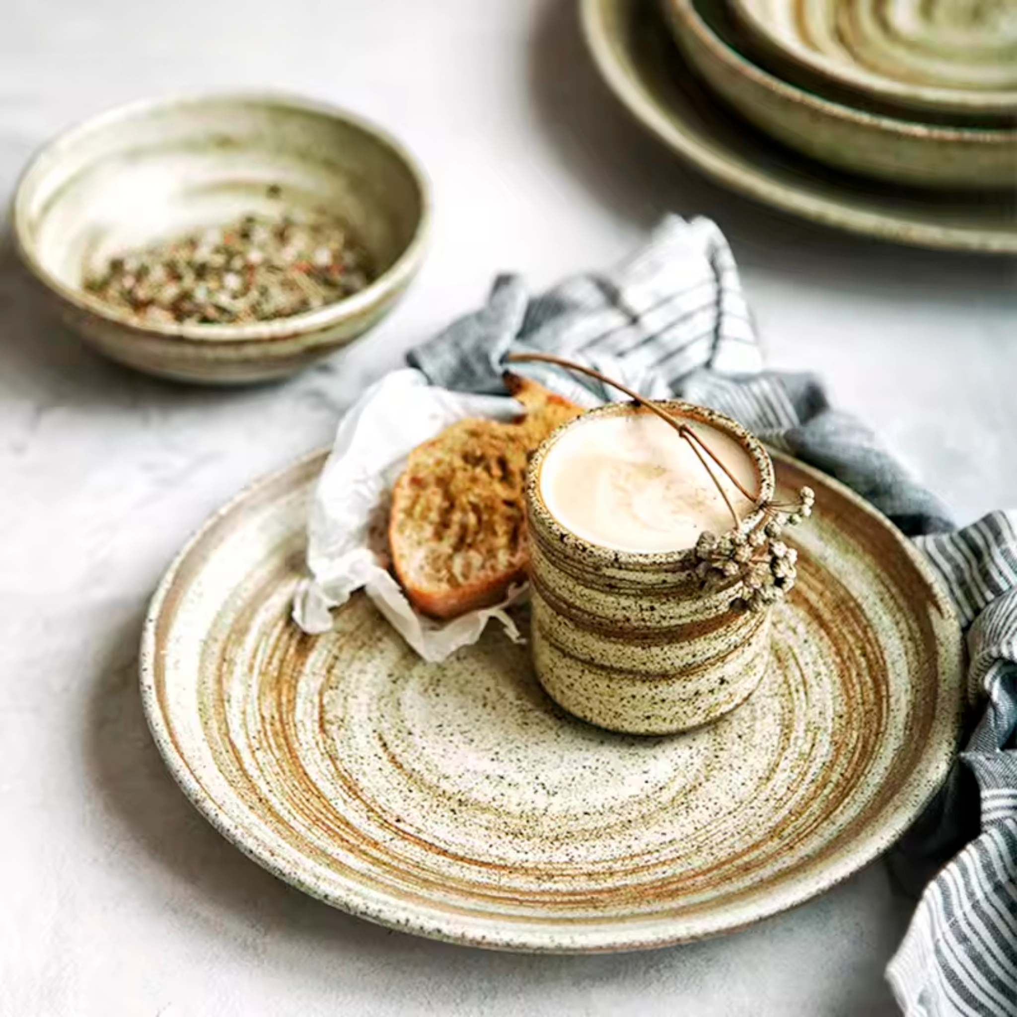 Artisan Terra: Premium Reactive Stoneware Dinnerware Set | Hand-Thrown Spiral Glaze Collection