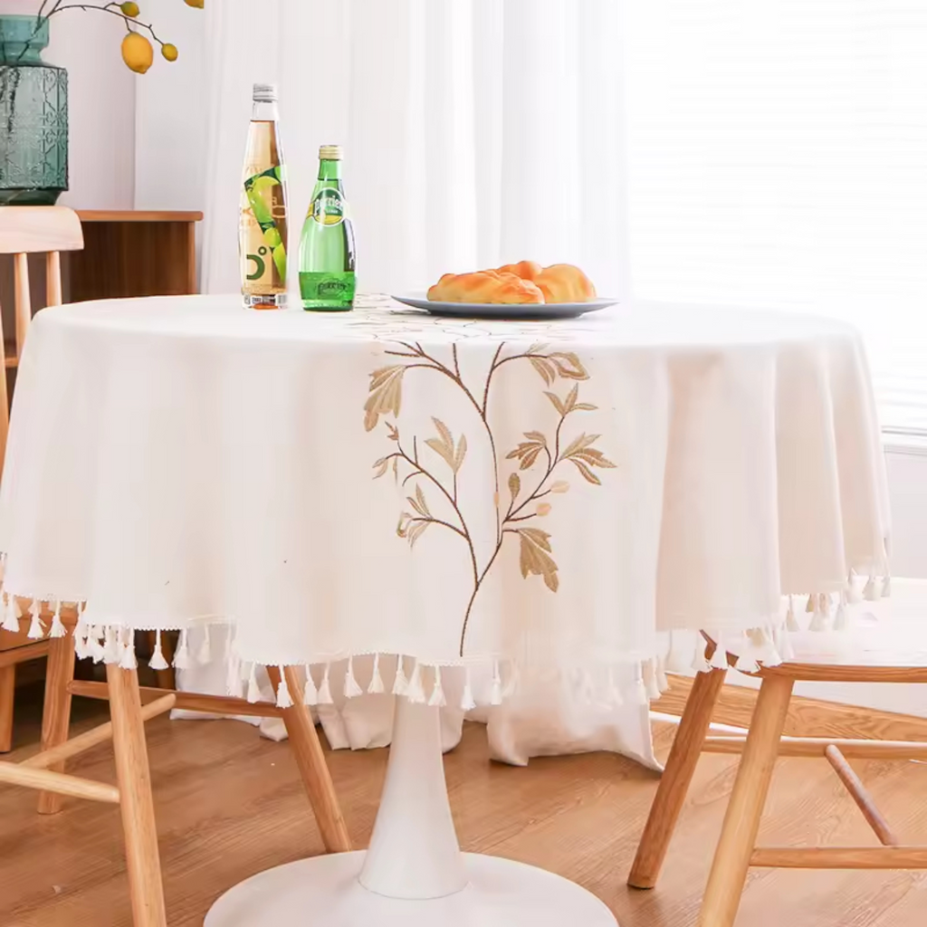 Artisan Botanical: Premium Round Embroidered Tablecloth | Elegant Tassel Edge Stoneware Companion