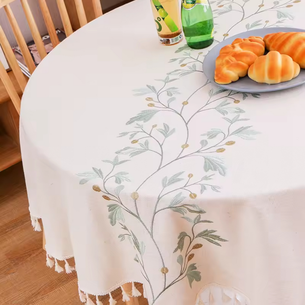 Artisan Botanical: Premium Round Embroidered Tablecloth | Elegant Tassel Edge Stoneware Companion