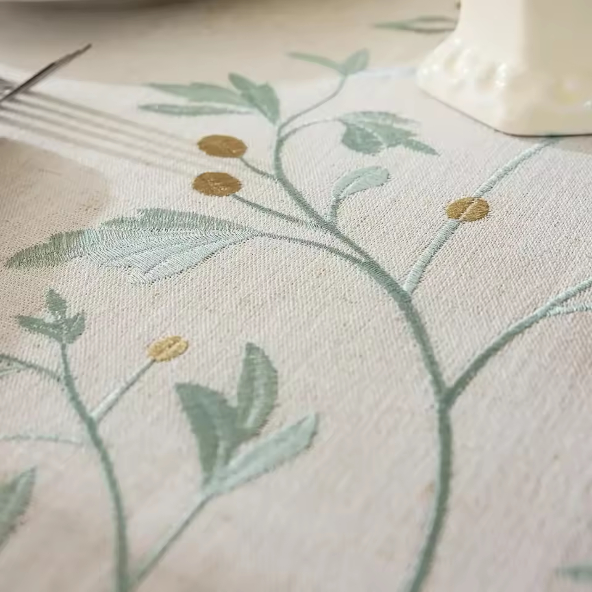 Artisan Botanical: Premium Round Embroidered Tablecloth | Elegant Tassel Edge Stoneware Companion